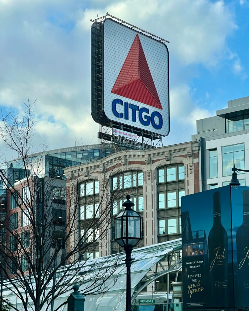 Famous CITGO sign with urban cityscape in Boston, Massachusetts.